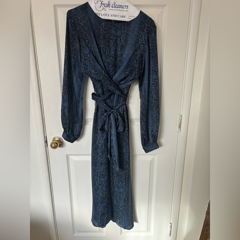 Selling a BCBG, blue snake skin dress